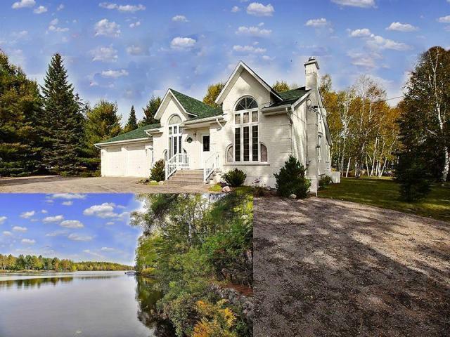 MAISON OU CHALET SUR BORD DE LAC NAVIGABLE