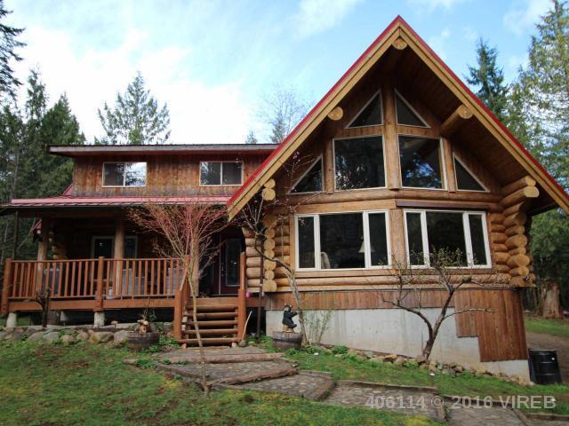 Beautiful log home built in 2005 on private 4.99 acres