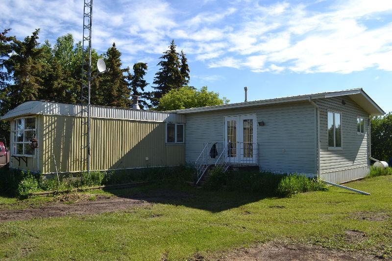 Mobile home with addition to be moved