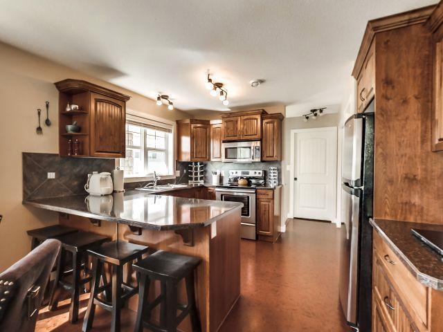 REDUCED! SHOWHOME QUALITY IN THIS CONDO-LACOMBE