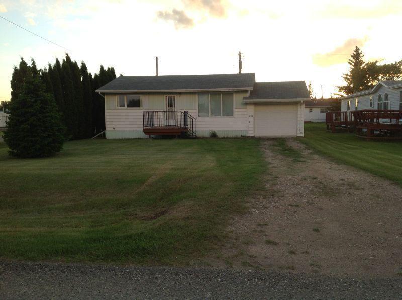 3 bedroom home with fenced back yard and 2 garages