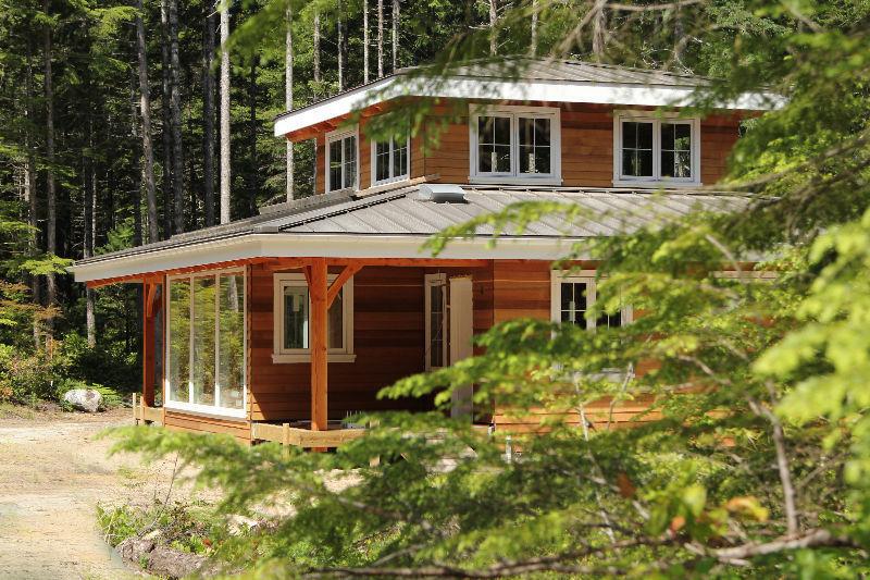 10 acre treed lot with 2 charming homes in the Comox Valley