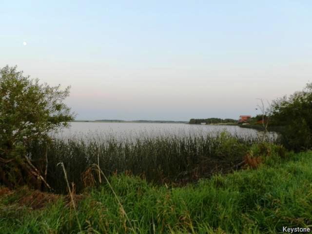 Landscaped 1.18 acre lakefront property in Shoal Lake Mb