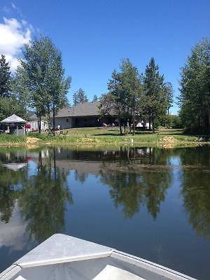 2 homes on 10 acres with privately stocked lake Kelowna