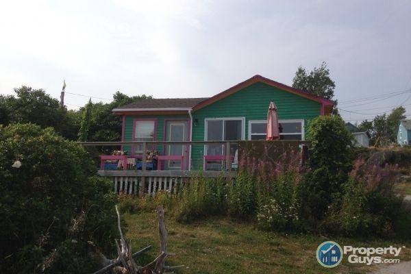 House & cottage on same ocean front property