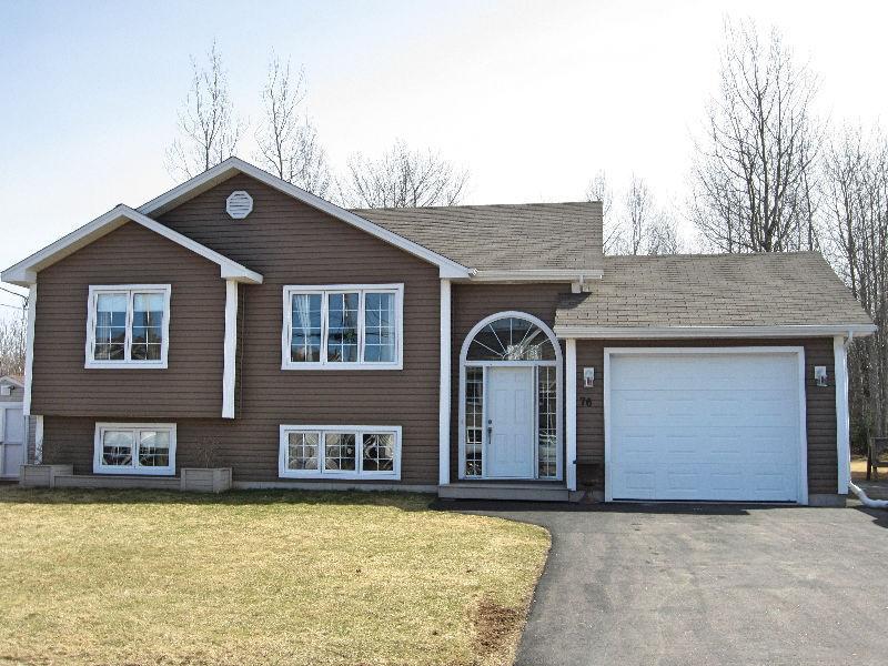 Beautiful home with 5 bedrooms, garage and great backyard
