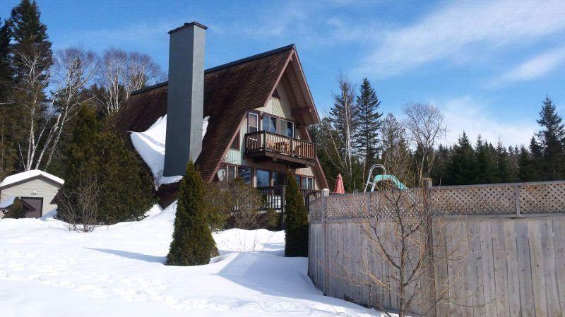 Propriété campagnarde à Saint-Basile sur terrain boisé