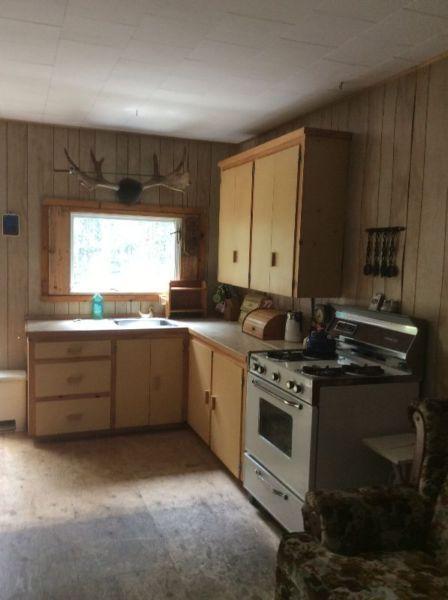 100 acres with hunting camp