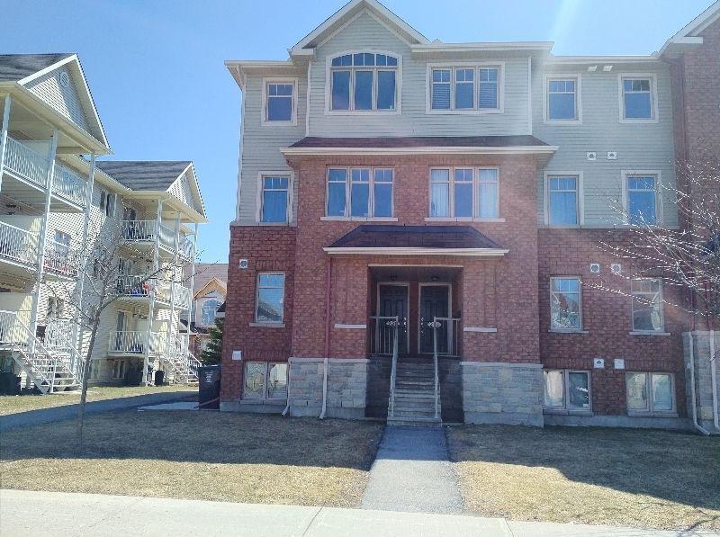 End Unit Townhome with 2 Bedrooms plus a Den