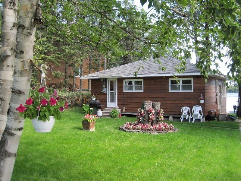 Lakefront Fully-furnished Cottage with Double Lot and Boat