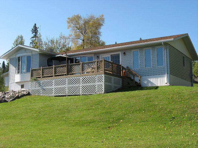 Lakefront year round home with 40x60 shop on Perrault Lake, Ont