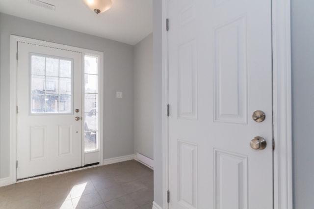 Open Concept, End Unit Townhome. Move-in Ready. Great Location!