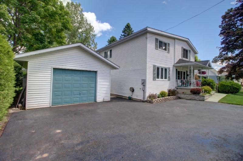 Gorgeous 4 Bedroom Home with DETACHED GARAGE on Quiet Street!