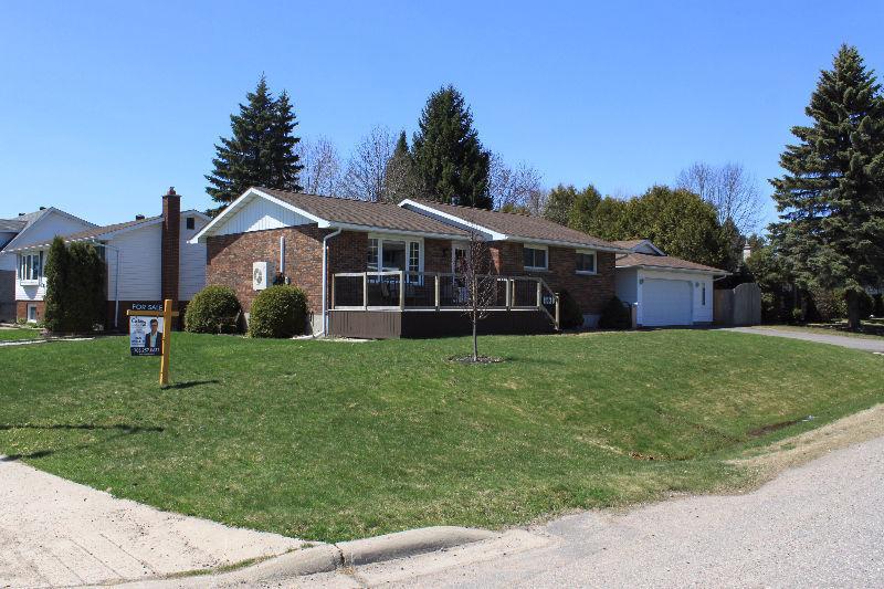 PRICE REDUCED - Updated East End Bungalow with Det. Garage