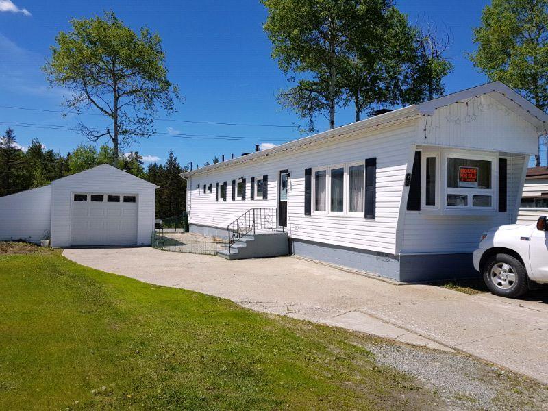 Fully Renovated Mobile Home with Detached Garage