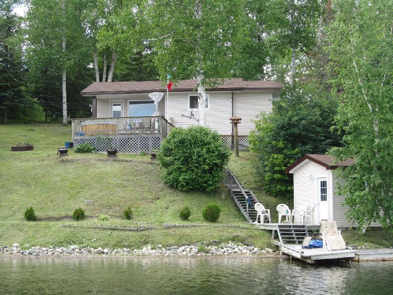COTTAGE WITH ROAD ACCESS ON BARBER'S BAY