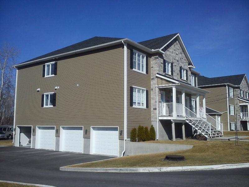 1175'c - Garage Individuel + 1 stationnement ext
