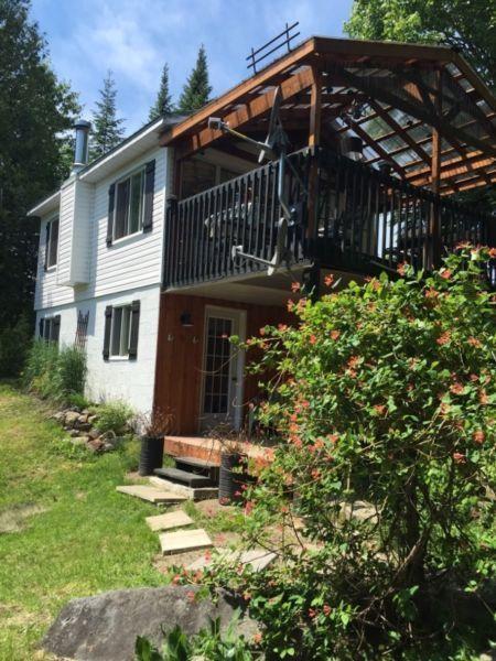 Chalet bord de l'eau, libre 1-6 juillet, st Adolphe d'howard