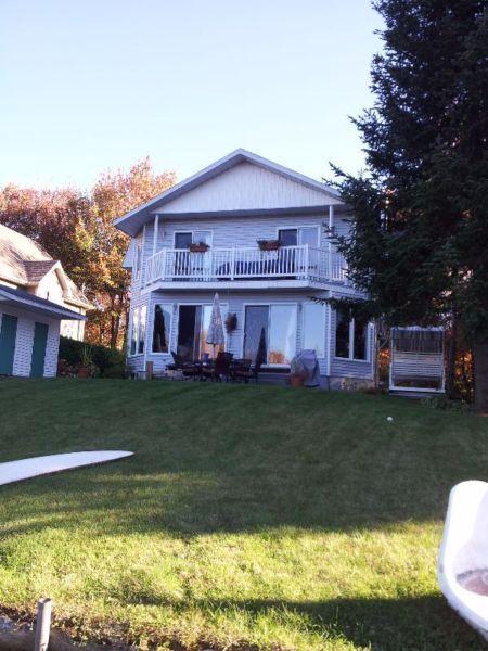superbe maison sur bord d'un lac