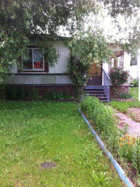 2 bedroom mobile home and lot for sale