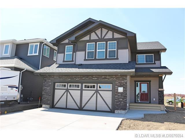 Tons of upgrades, enlarged garage, awesome open floor plan