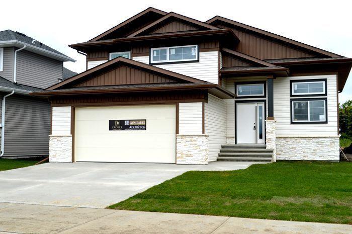 Get More Bang For Your Buck in Blackfalds! BRAND NEW + 5 Bdrms!