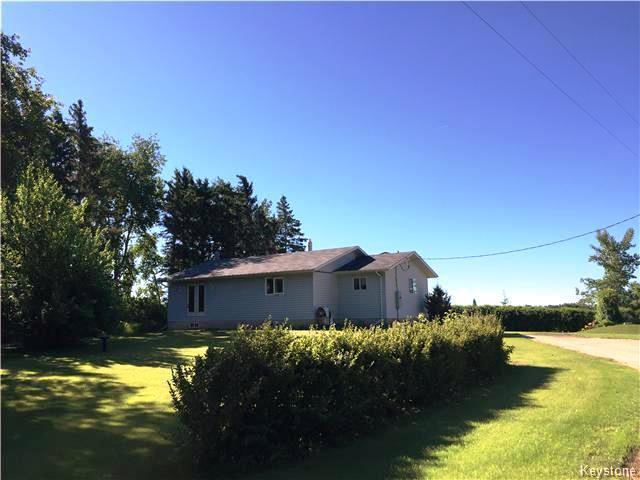 Acreage with a 2BR home in a private setting near Rossburn MB