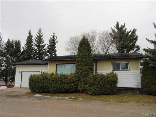 Corner lot with 2+1 BR home, mature trees and garden in Rossburn