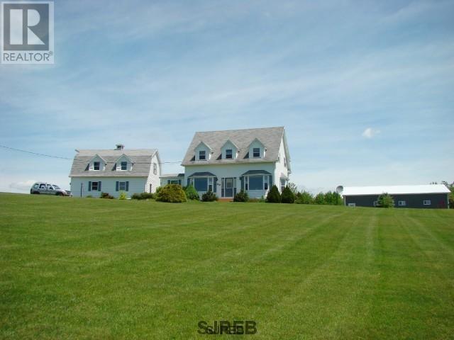 Country home, horse /hobby farm with 75 acers in SW NB