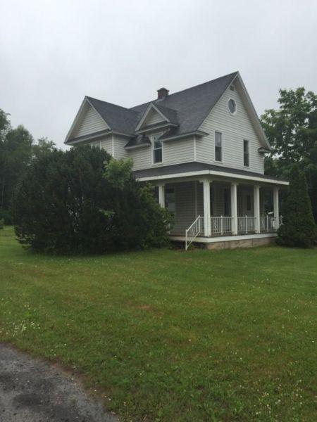 Large house with second building and 8 acres of land