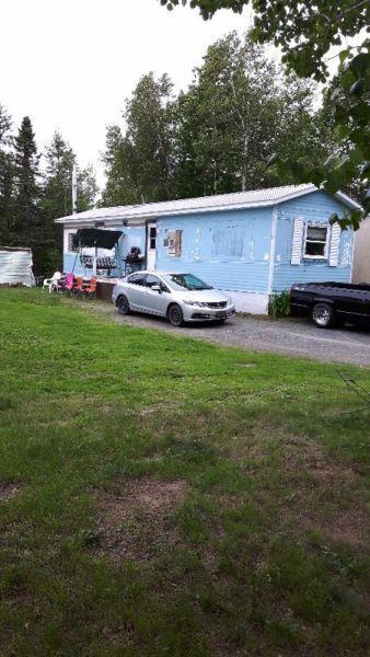 12x60 older mini home going very cheap move in ready