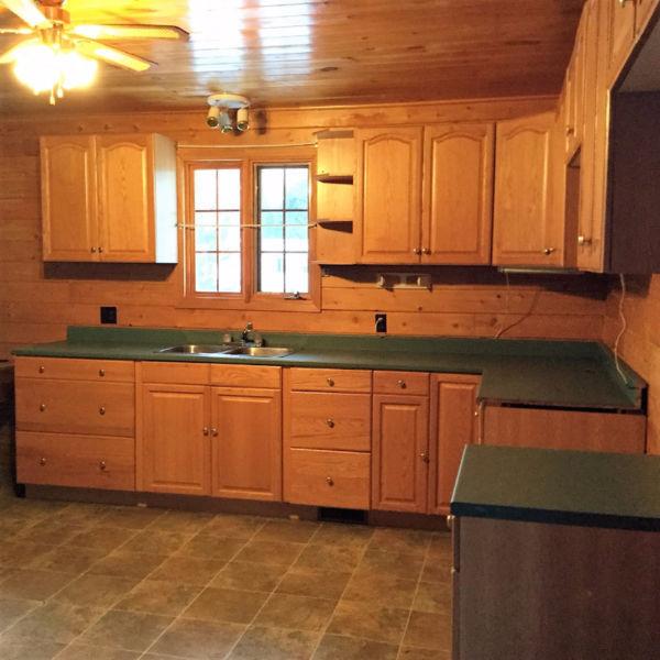 PRICED TO SELL LOG CONSTRUCTION HOME