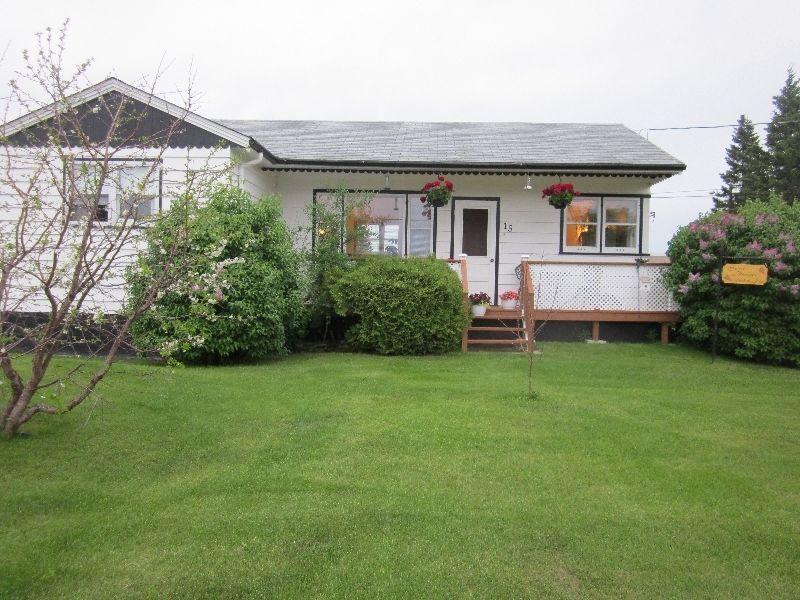 bungalow for sale in parkland near Duck Mts