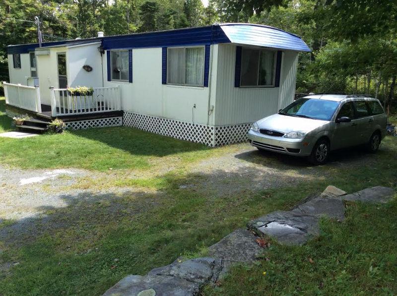 mobile home for sale on 1.3 acres of land