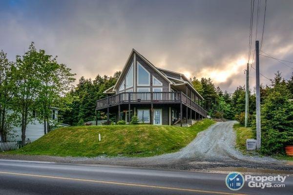 Remarkable A-frame chalet with complete wrap around deck