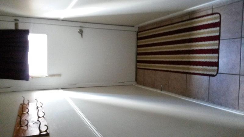 Bright and Spacious 2 Bedroom (Two Levels) Above Ground And Belo
