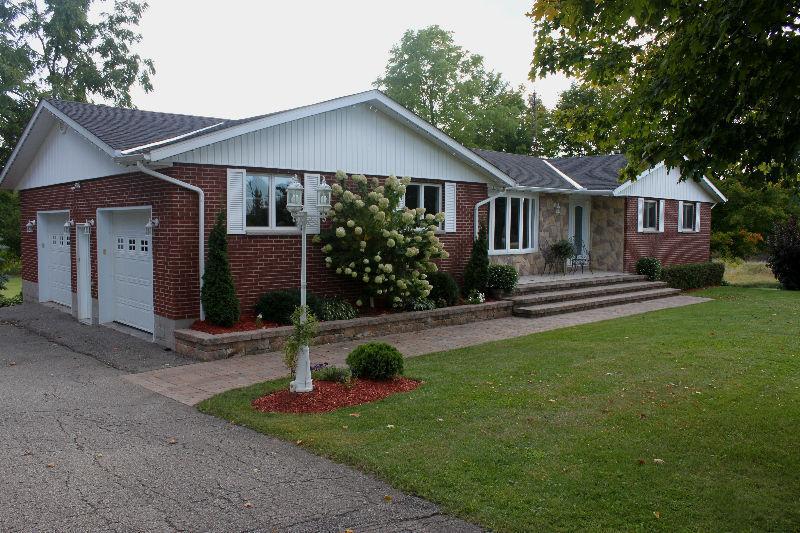 Brick Bungalow with Finished Walkout Basement on 4.3 Acres