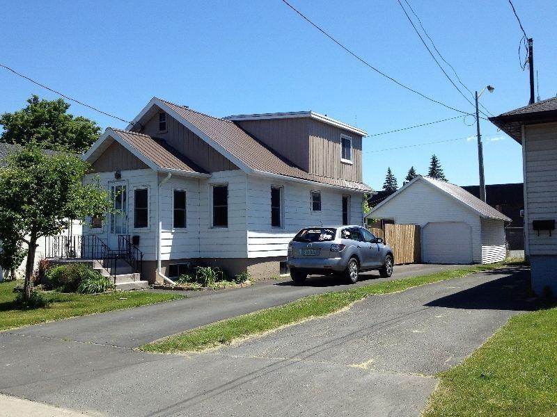 FULLY UPDATED 1 1/2 STOREY WITH DETACHED GARAGE