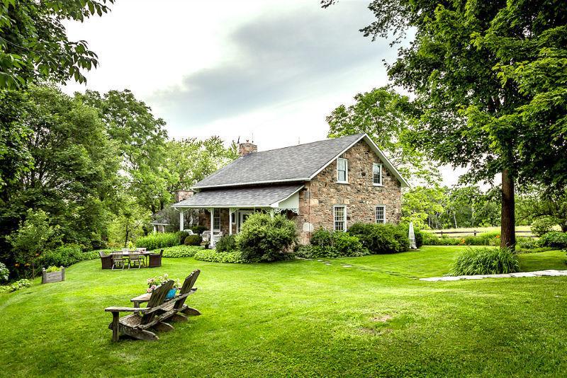 Beautiful Stone Farm House on Private 100 square acres
