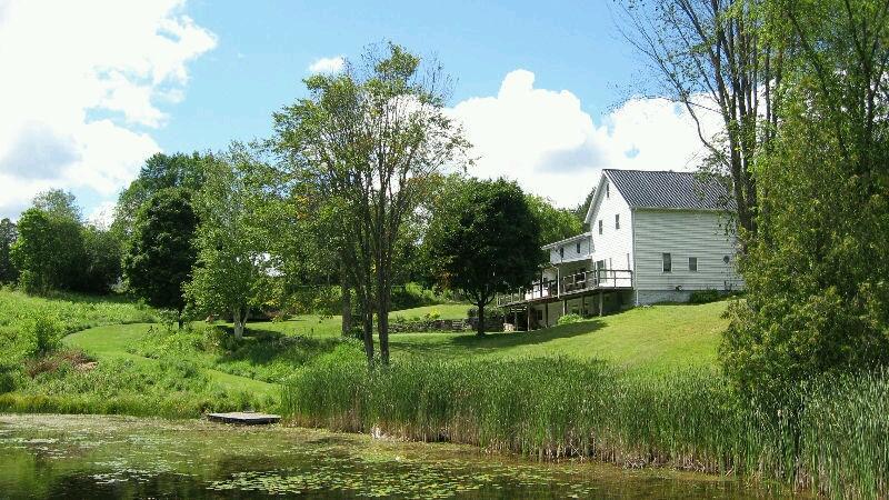 Maintained home on 17 Acres and a private pond! Quick possession