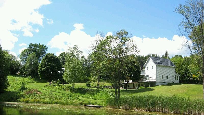 Maintained home on 17 Acres and a private pond! Quick possession