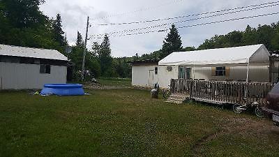 DOUBLE WIDE MOBILE HOME WITH LARGE WIRED GARAGE $25,000