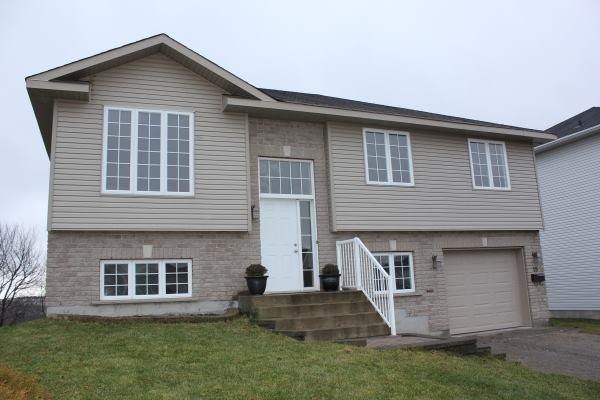 FRESHLY LANDSCAPED & NEW DECK OVERLOOKING CITY!