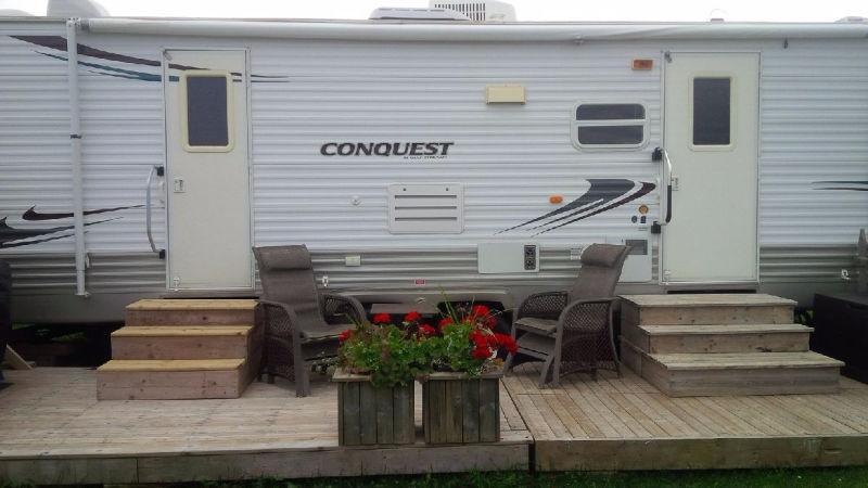 Camper at Twin Shores Campground -30 ft Conquest- 2 bedroom