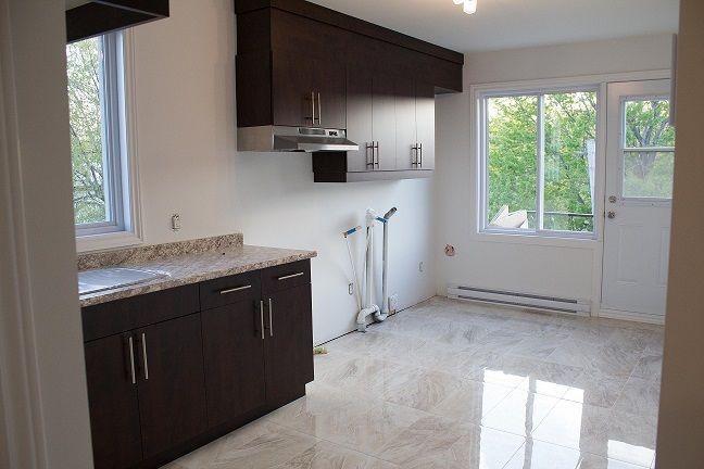 A 4 1/2 NEW condo close to downtown $1050.00 for rent