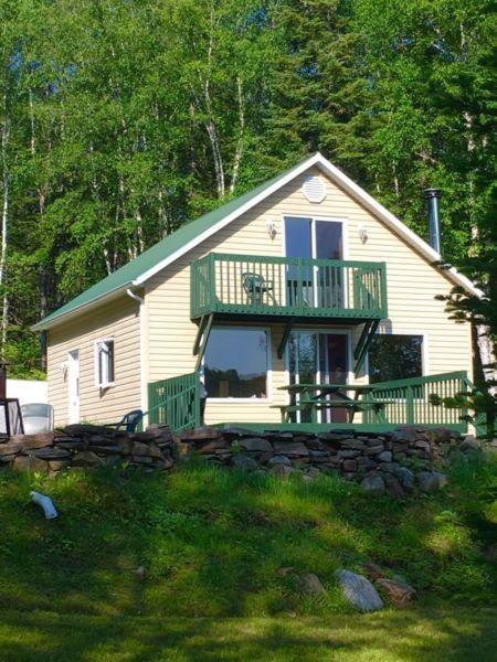 Chalet bord de l'eau à vendre