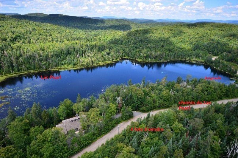 , magnifique terrain au Lac Pearl à vendre