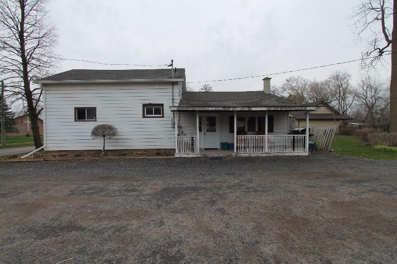 Quaint country 2 bed, 1 bath, 1.5 storey home with potential