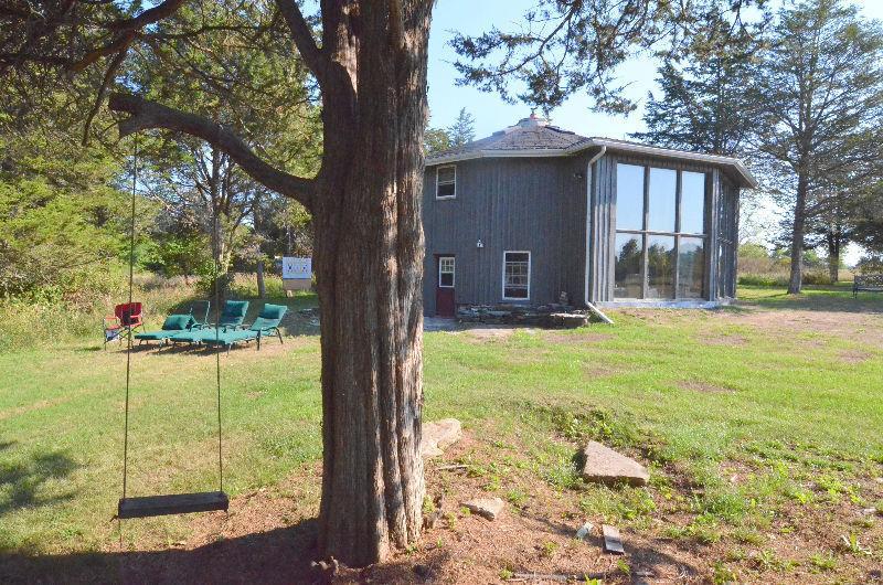 AMHERST ISLAND WATERFRONT PROPERTY OFFERING OVER 380' OF W/F