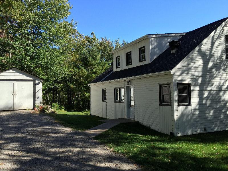 Family home on acreage overlooking Trout Lake